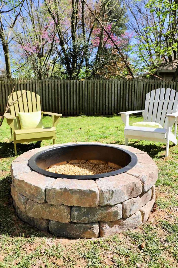 Fire Pit With Gravel Stones and Walkway