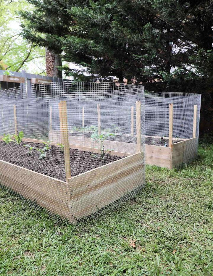 Raised Garden Bed with a Metal Fence