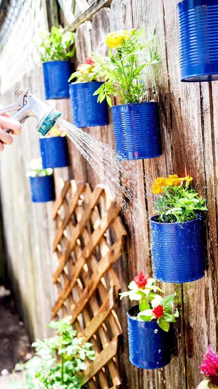 Backyard Tin Can Fence Garden