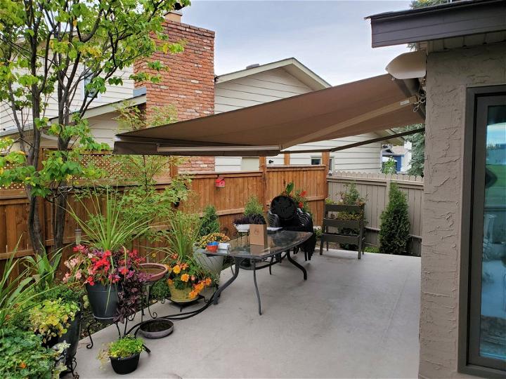 Backyard Patio Covered With A Sunesta Awning