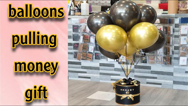 Balloons Pulling Money