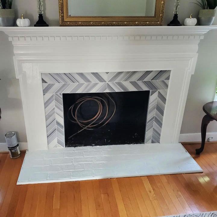 Amazing Chevron Tile Fireplace