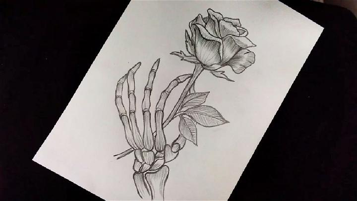 Draw a Skeleton Hand Holding a Rose