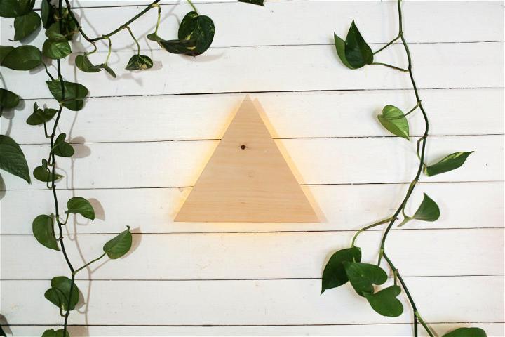 Awesome DIY Triangle String Light Wall Sconce