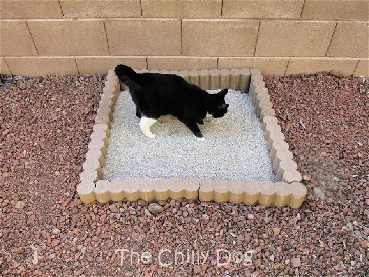 Caja de arena para gatos al aire libre